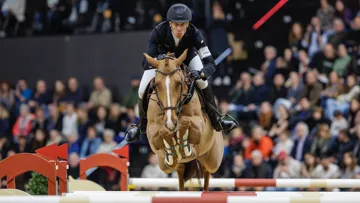 Henrik von Eckermann, tenant du titre et actuellement en tête du classement de la ligue d'Europe occidentale, en selle sur King Edward lors de l'étape de Bâle, qui lui a rapporté sept points.