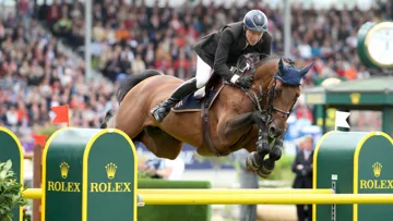 Chacco-Blue, ici dans le Grand Prix d’Aix-la-Chapelle en 2011 avec l’Allemand Andreas Kreuzer, est respectivement premier et deuxième des classements HorseTelex et Hippomundo pour l’année 2023.