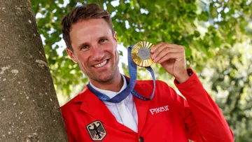 Avec sa médaille d’or olympique autour du cou, Christian Kukuk est « Un homme heureux ».