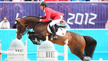La qualité de la semence de Plot Blue, ici aux Jeux olympiques de Londres avec l’Allemand Marcus Ehning, a varié au gré des années, comme celle de nombreux autres étalons de sport.