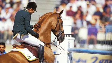 Rodrigo Pessoa, tout juste éliminé des Jeux olympiques de Sydney, en 2000, avec Baloubet du Rouet.