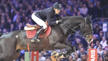 Simon Delestre et Qlassic Bois Margot, ici à Villepinte lors du Gucci Paris Masters, n'ont cessé de progresser tout au long de l'année 2012. Crédit Scoopdyga