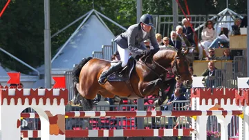 Déjà onzièmes du Grand Prix de Rome, le mois dernier, Philipp Weishaupt et Monte Bellini ont confirmé leur retour au sommet en remportant cet après-midi celui de Rotterdam. Photo Scoopdyga