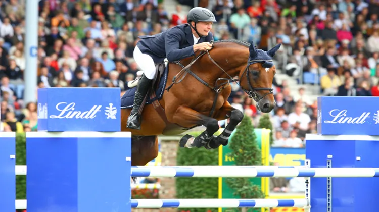 Patrick Stuhlmeyer et Lacan 2, ici lors du Grand Prix du CHIO d?Aix-la-Chapelle l?an dernier, ont contribué à la propulsion de l?équipe Allemande sur la première marche du podium. Photo Scoopdyga