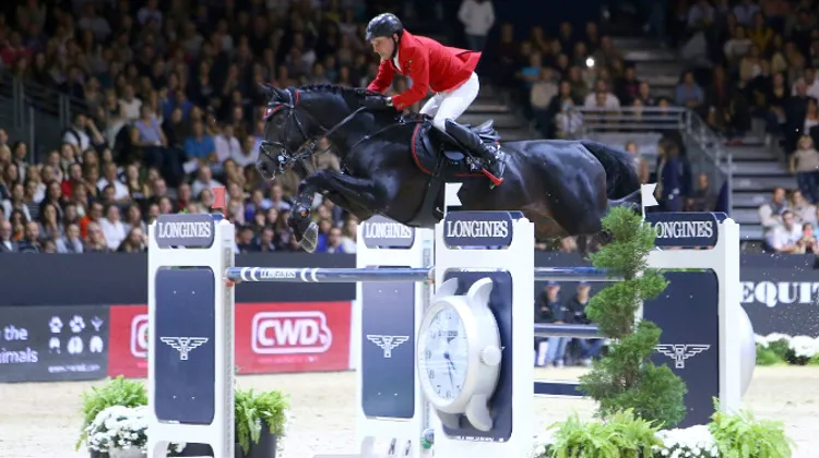 Hans-Dieter Dreher et Embassy II, ici à Lyon, ont réalisé un magnifique double sans-faute leur offrant la victoire du Grand Prix de Leipzig. Photo Scoopdyga
