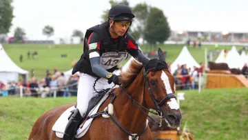 Alex Hua Tian s'est imposé aujourd'hui dans le CIC 3* de Bramham aux commandes de Don Genito. Ici, le Chinois aux Jeux équestres mondiaux 2014 associé à Harbour Pilot C.