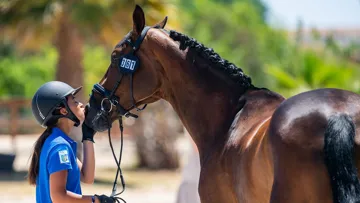 Diana Borovyk, cavalière de dressage sélectionnée pour recevoir une bourse d’études afin de soutenir la préparation à l’entraînement et à la compétition dans le but ultime de représenter l’Ukraine aux championnats FEI en 2022 et 2023