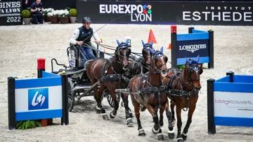 Benjamin Aillaud avec son attelage dans une étape Coupe du monde à Lyon en 2022