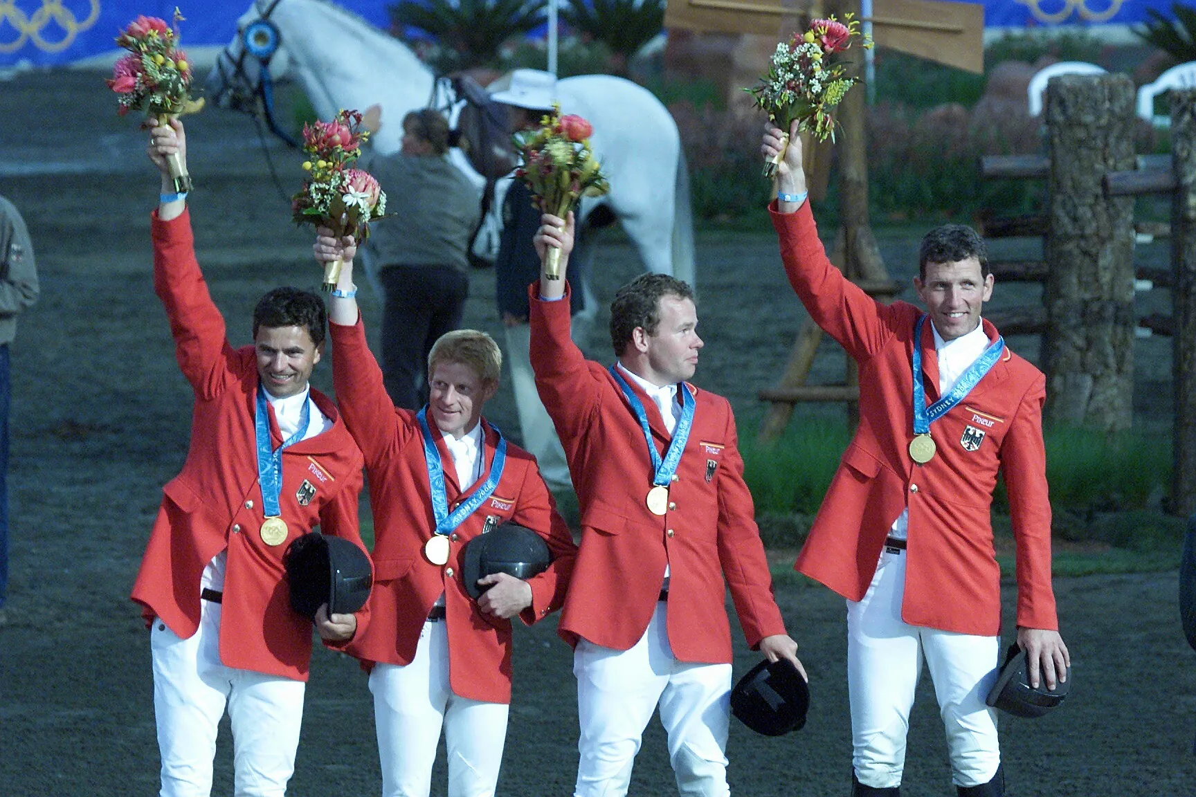 Ici aux côtés d'Otto Becker, Marcus Ehning et Ludger Beerbaum, Lars Nieberg a atteint le sommet de l'olympe aux Jeux de Sydney.