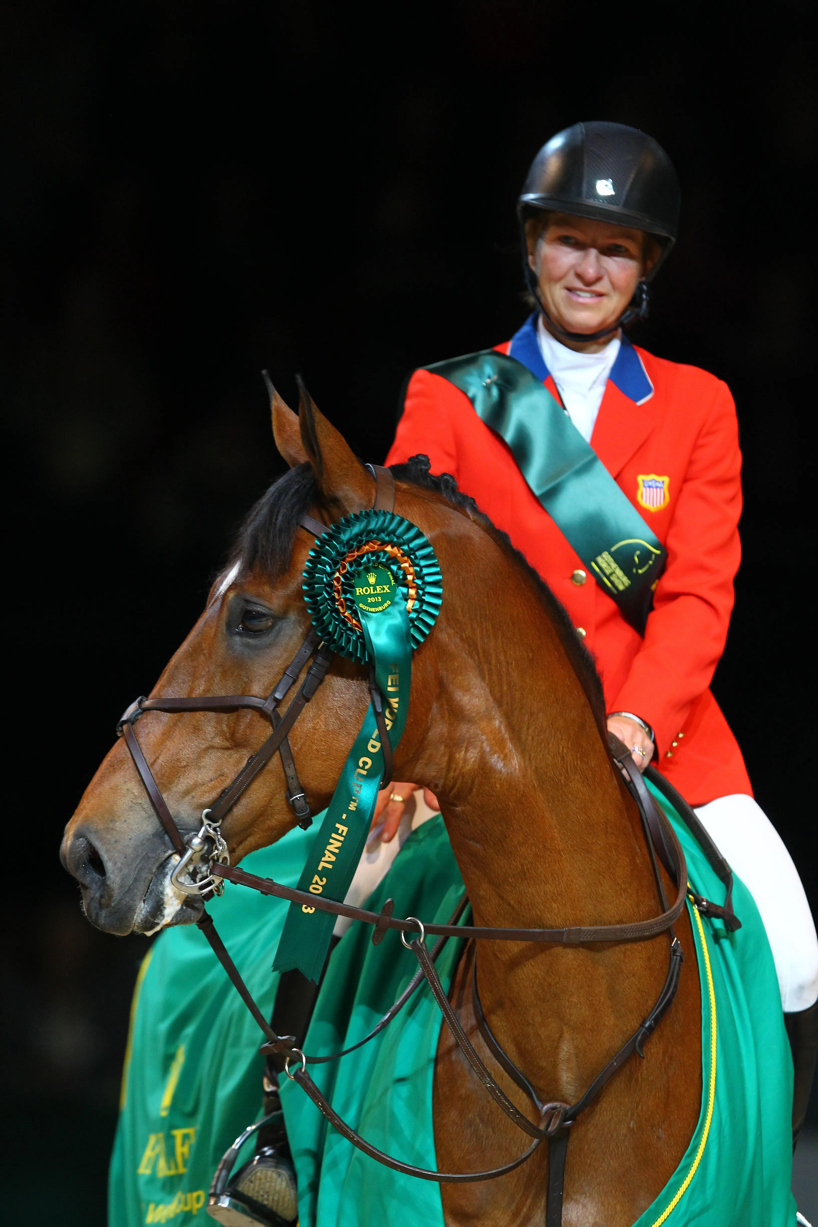 Simon arbore ici le flot du lauréat de la finale de la Coupe du monde de Göteborg, en 2013. 