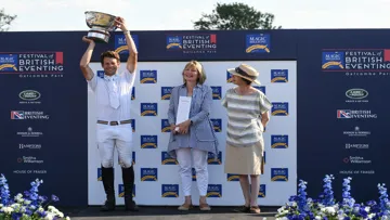 Chris Burton accepts the trophy