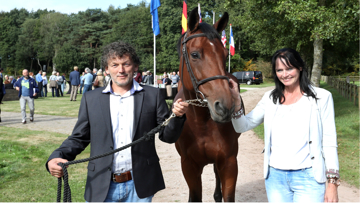 Breeders of Zenith Mr and Mrs Voort  with their champion
