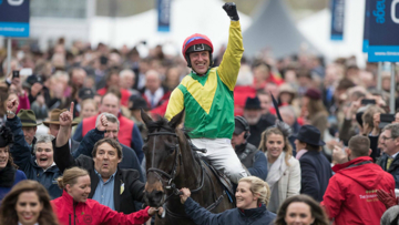 Robbie Power rides in on Sizing John after winning the Gold Cup