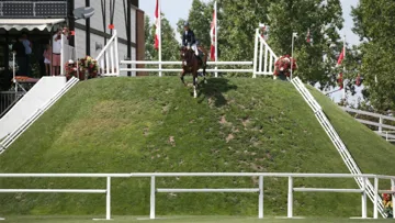 Heading down the Spruce Meadow Bank- Richard Spooner & Cristallo