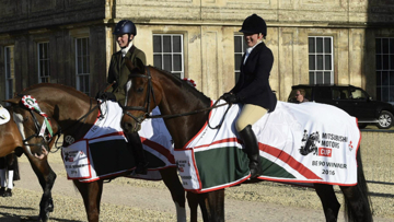 Katie Hancock & Sophie Walker get their prizes outside Badmnton House