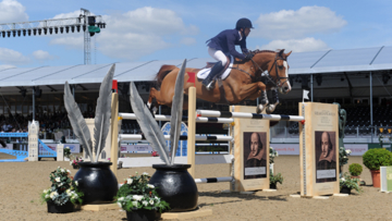 Kent jumps the Shakespear fence on the way to Windsor GP win
