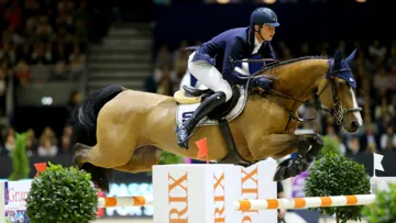 Daniel Deusser jumps the Grand Prix Fence in Lyon