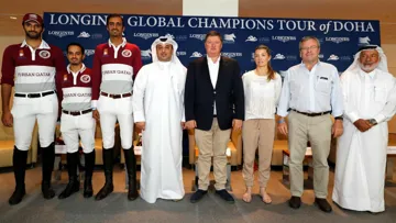 Jan Tops Centre with wife Edwina, the Qatrari team and the organisers.