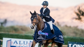 Adrienne Sternlicht (USA) is all smiles aboard Bennys Legacy following a big win in the $100,000 Longines FEI Jumping World Cup™ Thermal on 9 November 2019.