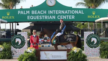 Cian O’Connor and Lassaro Delle Schiave in their winning presentation with ringmaster Steve Rector