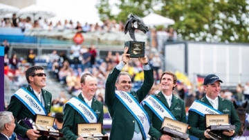 Chef d’Equipe Rodrigo Pessoa holds the trophy aloft as Team Ireland celebrate victory at the Longines FEI Jumping Nations Cup™ Final 2019 in Barcelona (ESP).