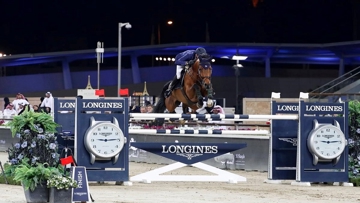 Daniel Deusser flying over the final fence