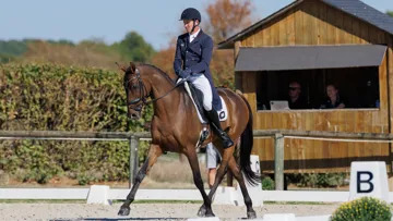 Thomas Carlile et Golden de Béliard au Mondial en piste lors du test du dressage.