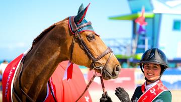 Nina Mallevaey lors de sa victoire dans une épreuve à 1,55m avec Chacco Kid au CSI 5* de Miami.