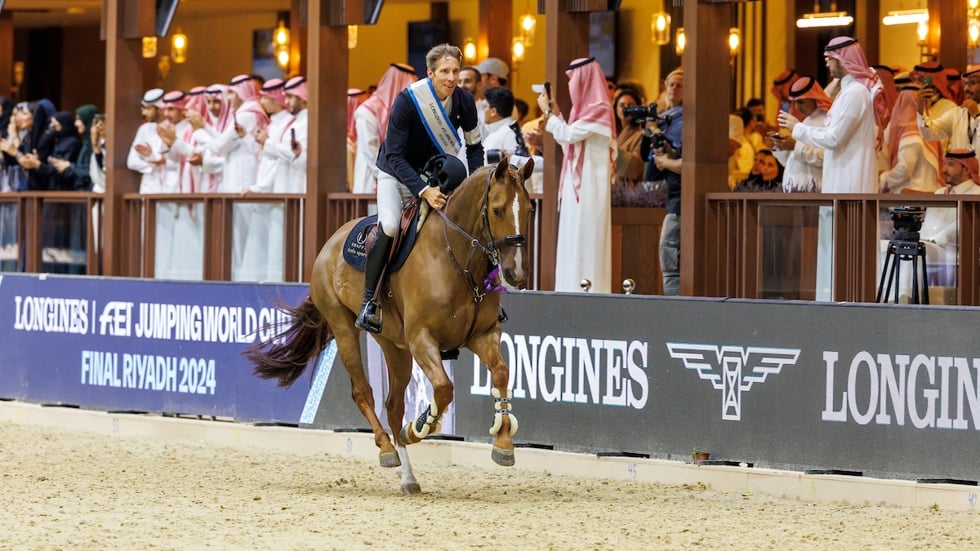 Henrik von Eckermann en King Edward na hun tweede overwinning op rij in de Wereldbeker finale