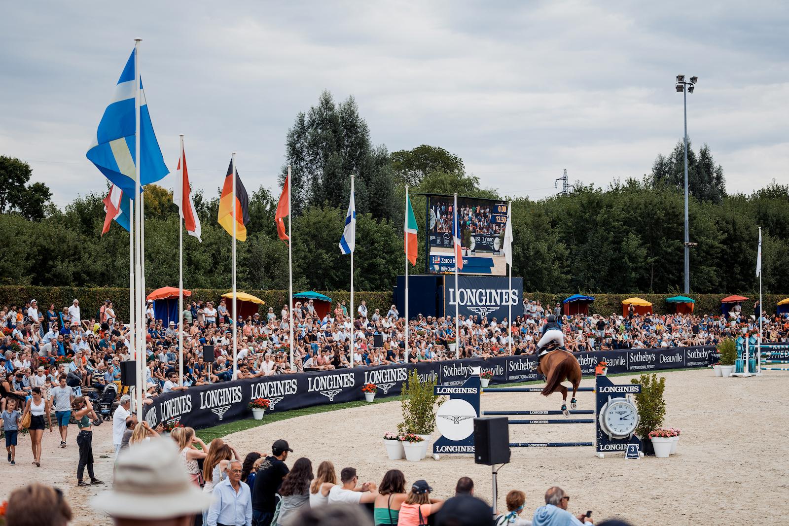 A crazy crowd gathered around the Longines International Horse Pole in Deauville.