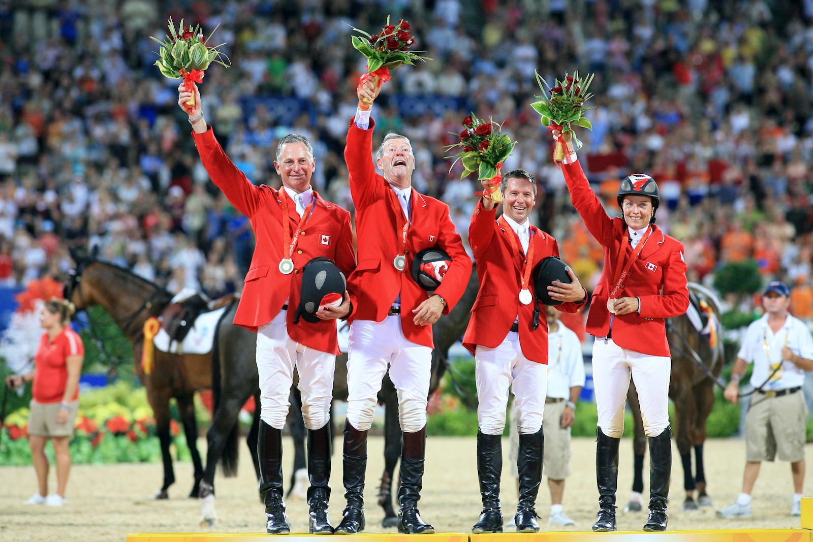Mac Cone, Ian Millar, Éric Lamaze et Jill Henselwood, médaillés d'argent lors des Jeux de Pékin en 2008.