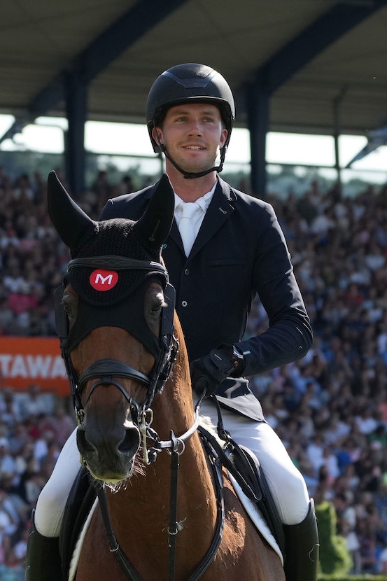 Gerrit Nieberg et son cheval masqué Ben 431, héros du jour à Aix-la-Chapelle. 