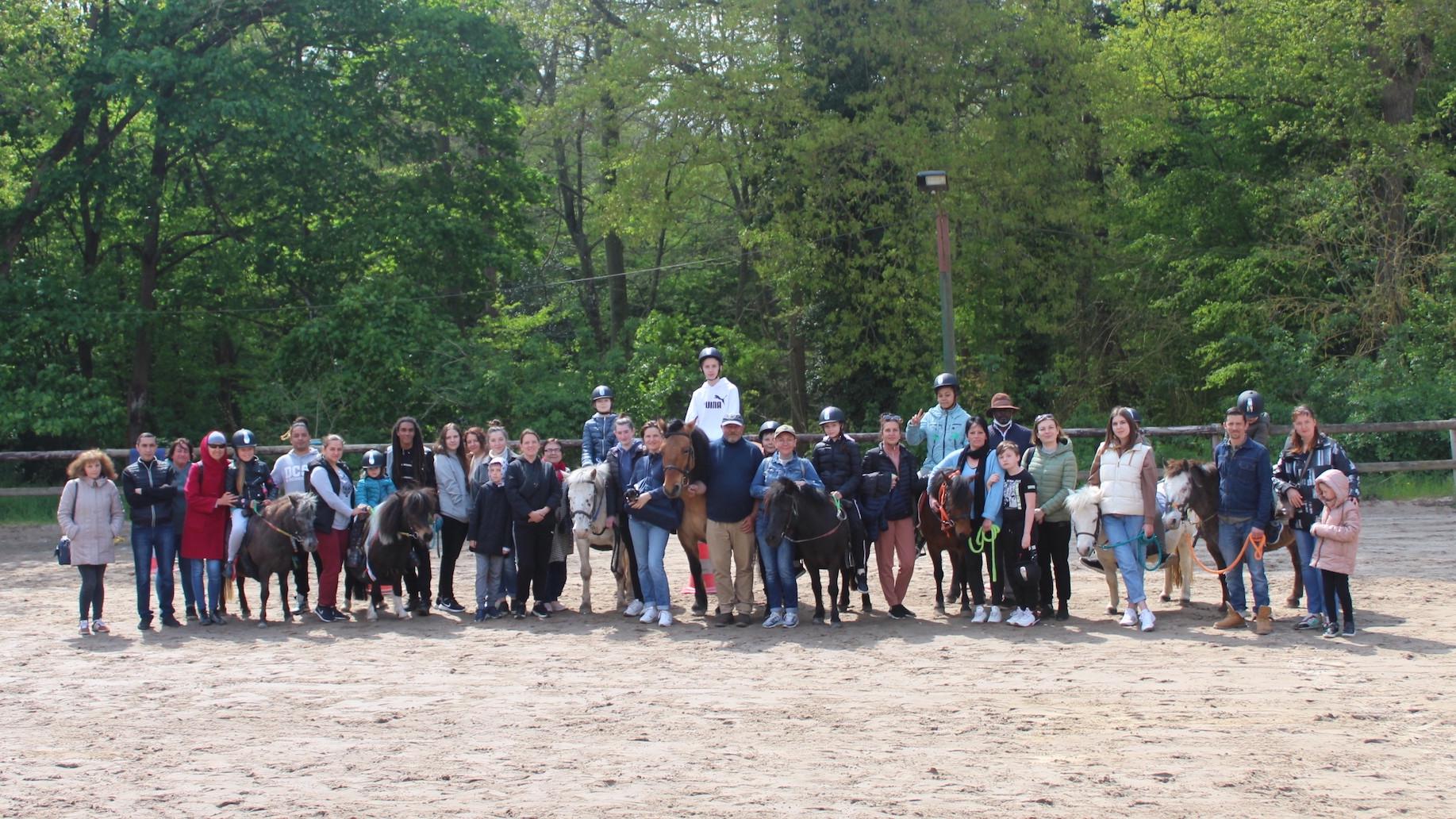 Photo of a group greeting Wednesday at the equestrian village of Goms. 