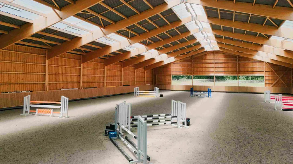 Nouveau complexe équestre du Haras d'Alys réunit trois bâtiments : un manège, un bâtiment de liaison et une écurie. 
